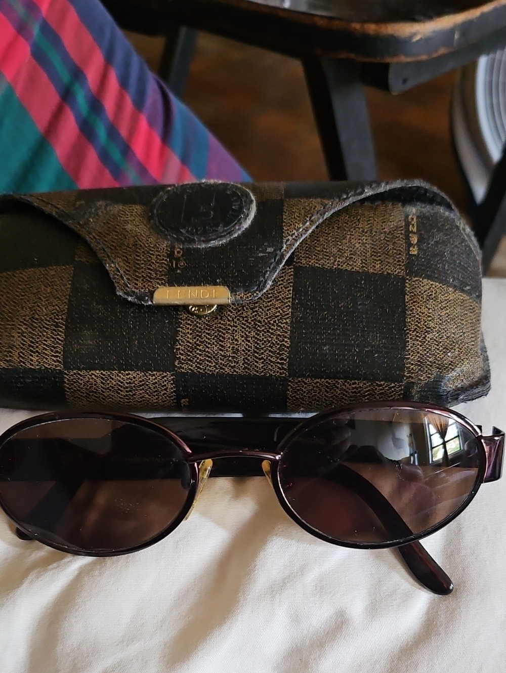 Designer Checkered Glasses Case with Brown Sunglasses. Fendi